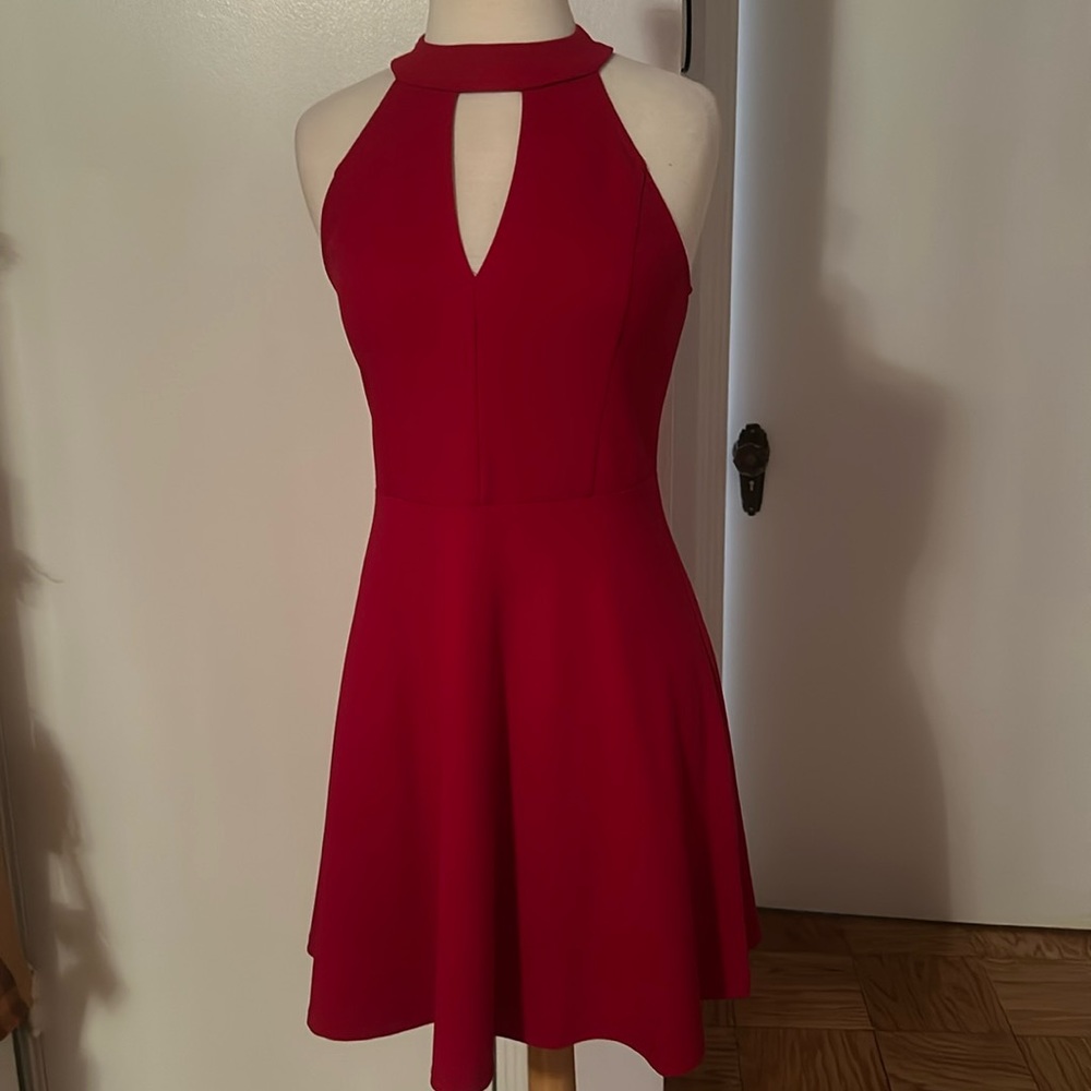 Red Nordstrom Rack dress. Flows nicely. Sexy cut out front